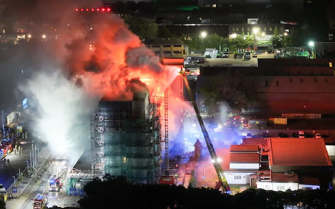 Fire engulfs apartment building in London, sending 2 to hospital