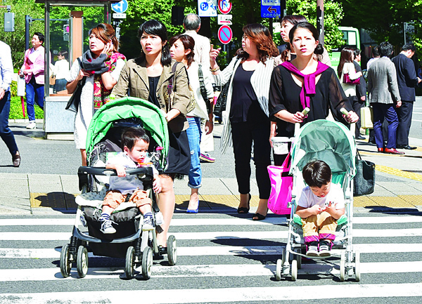 Japan household spending picks up, eases concern about economy