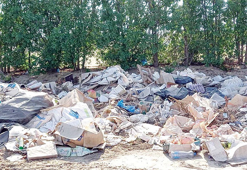 Wafra farms area turns garbage dump