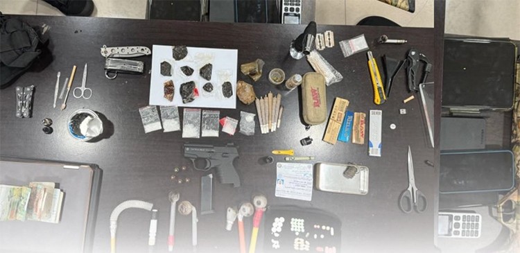 Hawalli Authorities Seize Narcotics and Firearm from Wanted Criminal