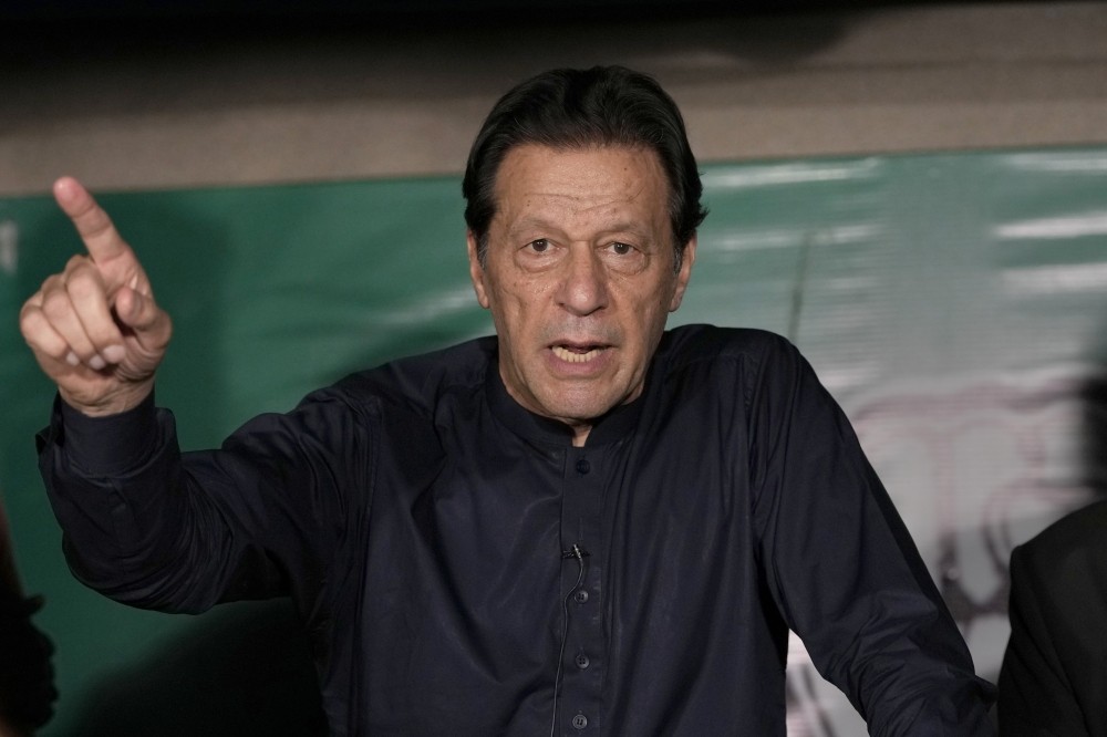 Pakistani court overturns Imran Khan's convictions, new arrests follow