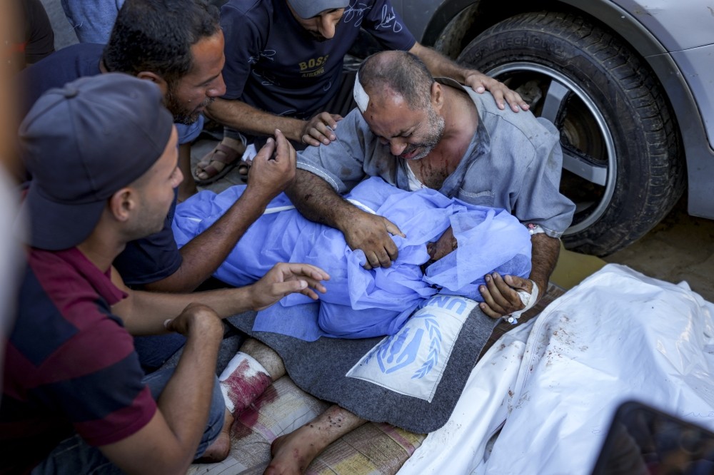 Israeli airstrike on a Gaza school used as a shelter kills at least 80